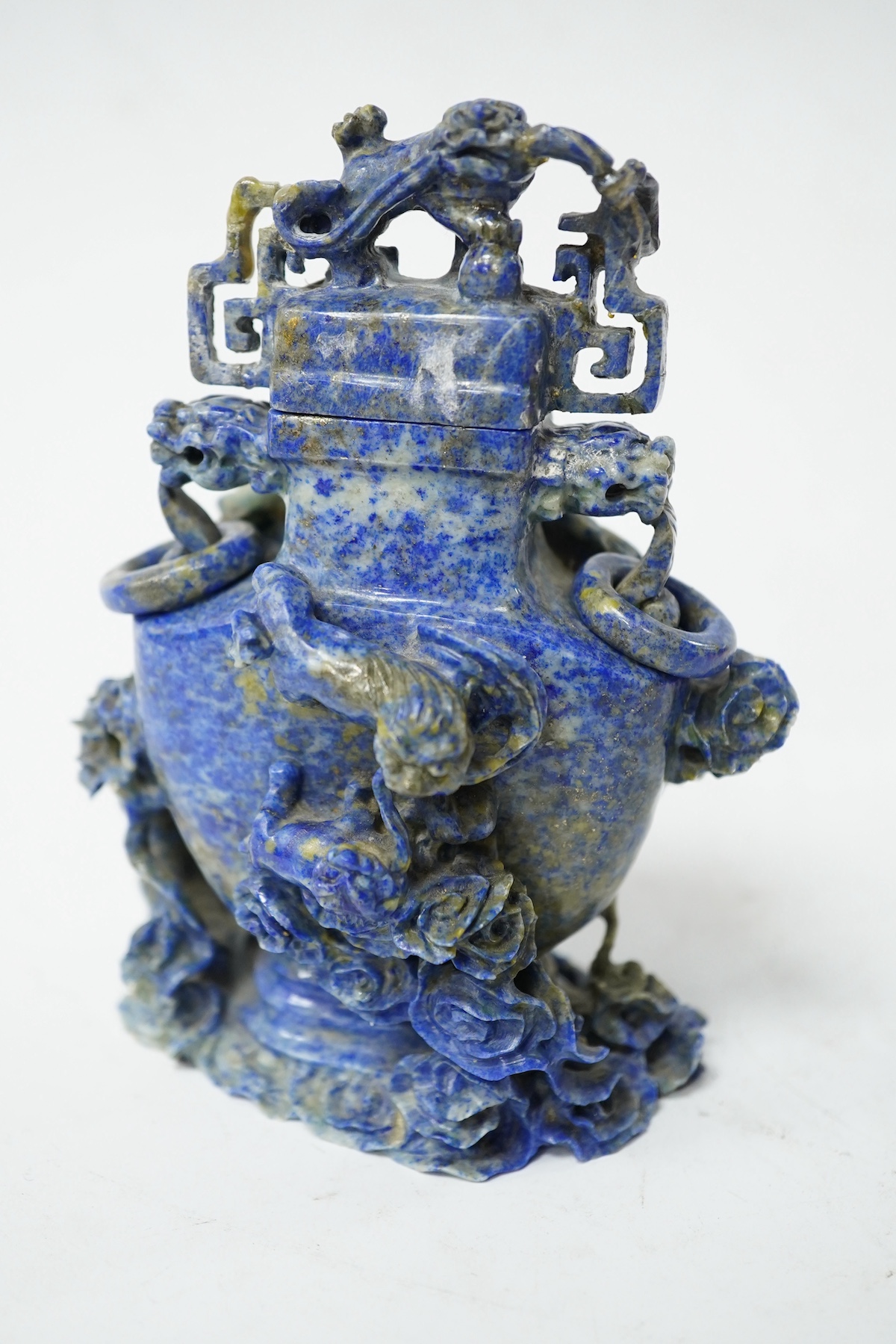 A Chinese lapis lazuli vase and cover, late 19th/early 20th century, 14cm high. Condition - fair, minor chips